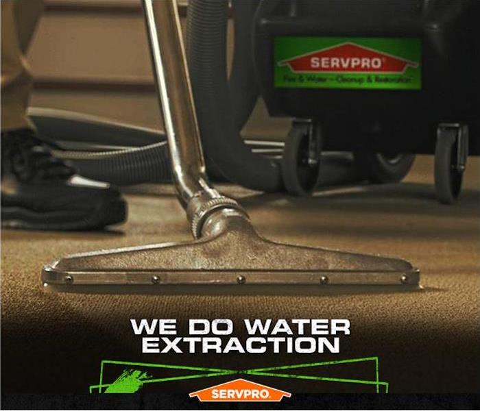 SERVPRO poster extraction wand on carpet